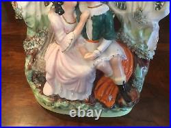 A BEAUTIFUL RARE ANTIQUE STAFFORDSHIRE FIGURE, A COURTING COUPLE 1800's