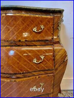 A Rare & Beautiful Bombe form drawer cabinet with marble top. French 20th
