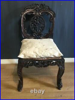 A rare and beautiful very ornate Anglo Indian occasional chair in teak c 1880