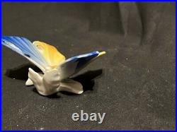 Antique rare beautiful porcelain butterfly, sunbathing on a twig, marked bottom