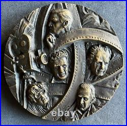 Beautiful antique rare bronze medal with high reliefs dedicated to cinema art