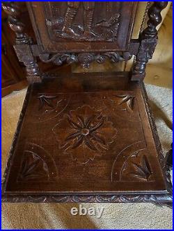 Beautiful pair of unique and rare carved antique oak hall chairs