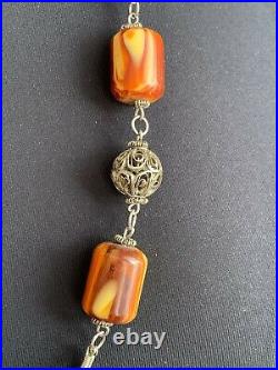 Rare Antique One strand Necklace of Baltic Amber Resin Beads, tassel of chains